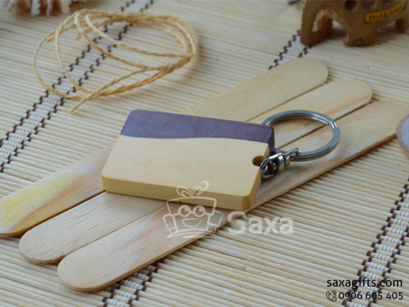 Wooden keychain with yellow brown mixed in rectangle form