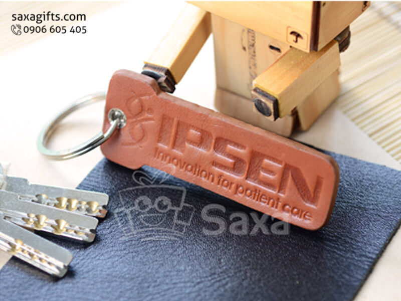 Leather keychain with logo printed in key shape