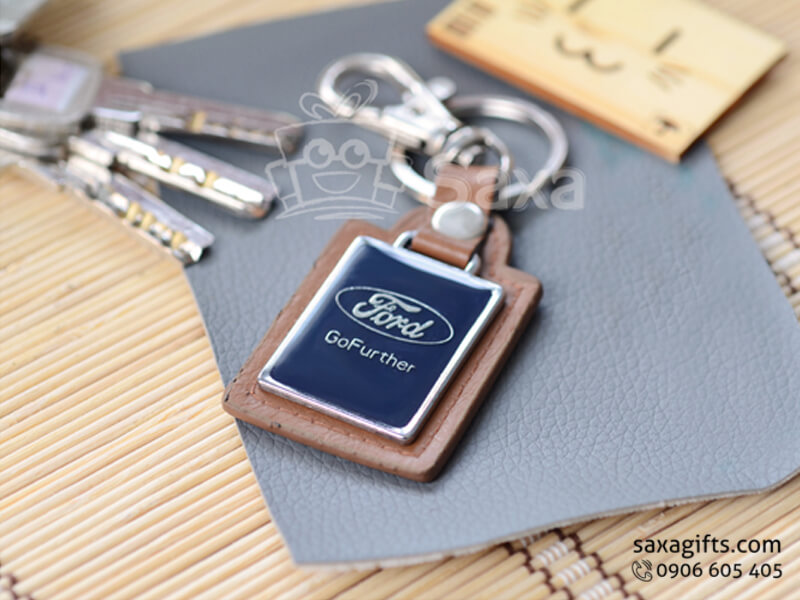 Leather keychain with logo printed, gloss plastic covered metal board