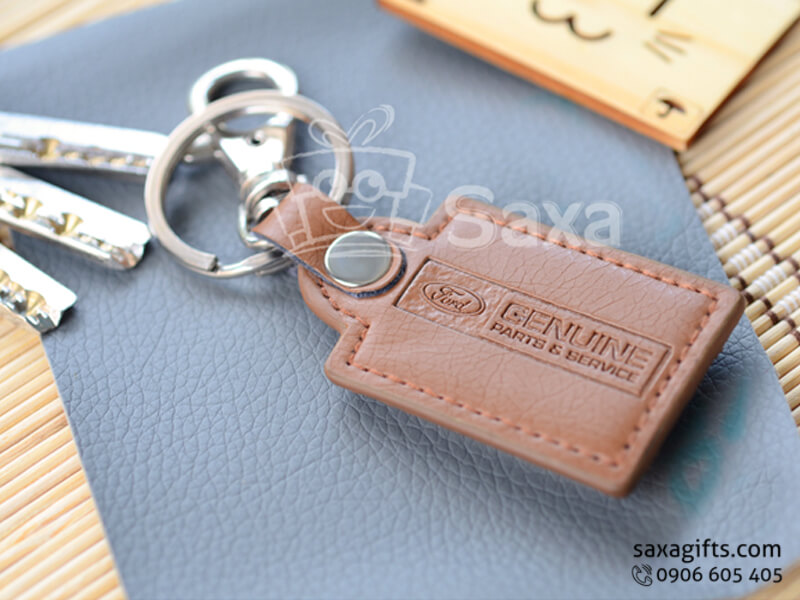 Leather keychain with logo printed, gloss plastic covered metal board