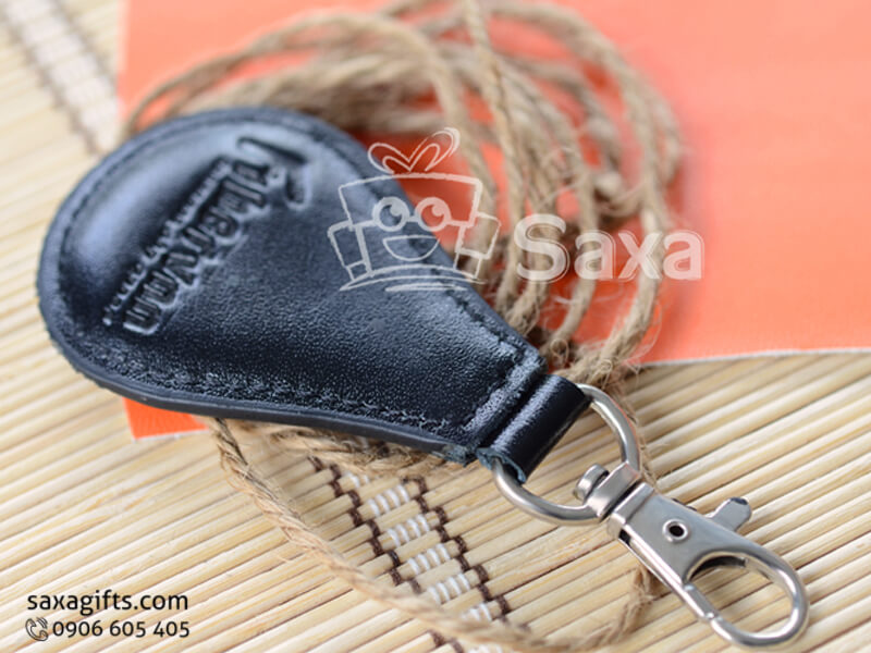 Leather keychain with logo printed in drop shape and pushing ring