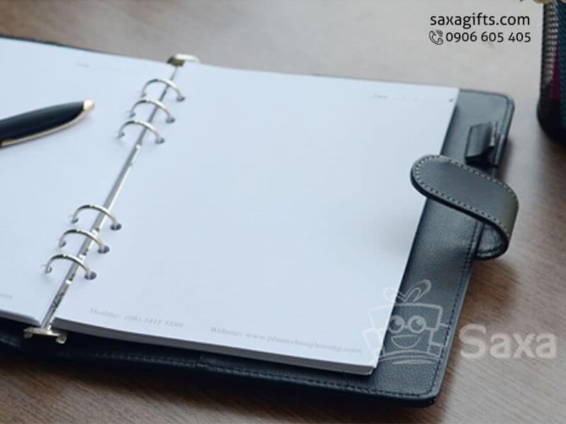 Leather notebook with rings and highlighted white clew