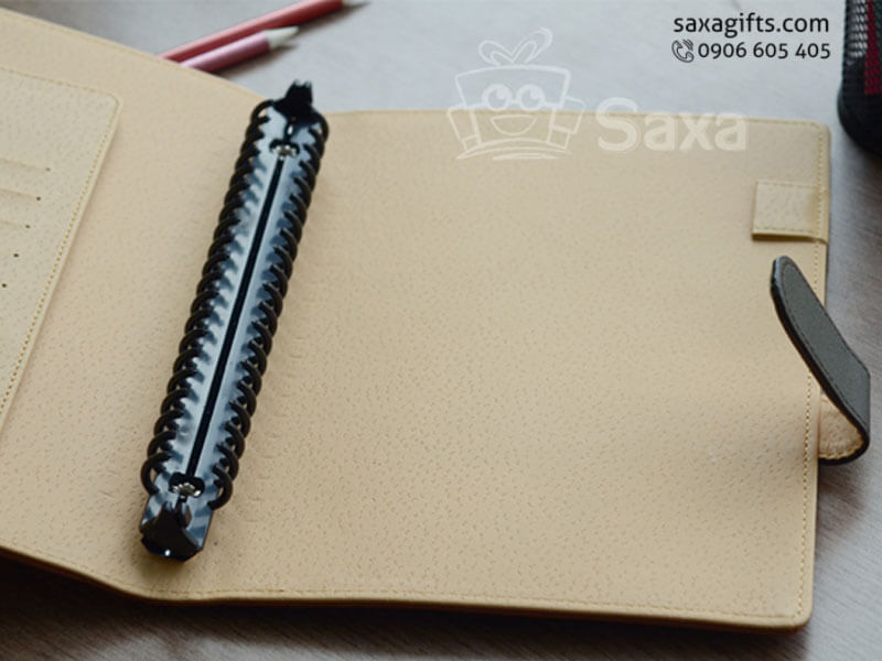 Leather notebook with rings, stylish colours mixed and pinned jack