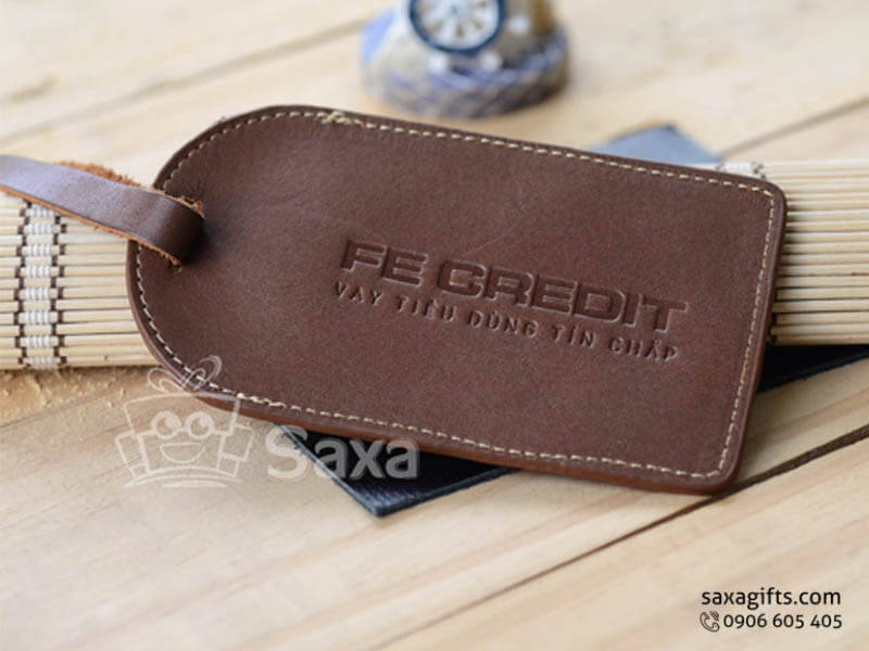 Luggage tag with logo printed made from pure leather and a cap