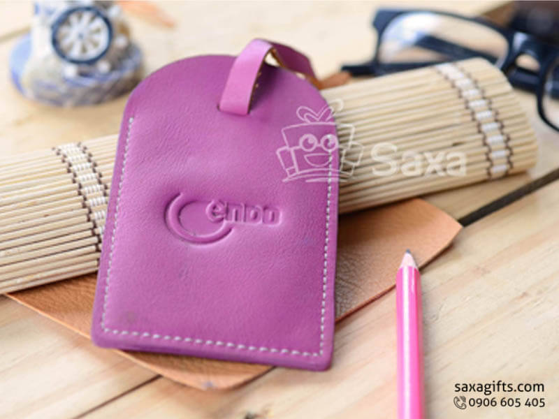 Luggage tag made from stylish pink purple simili leatherette