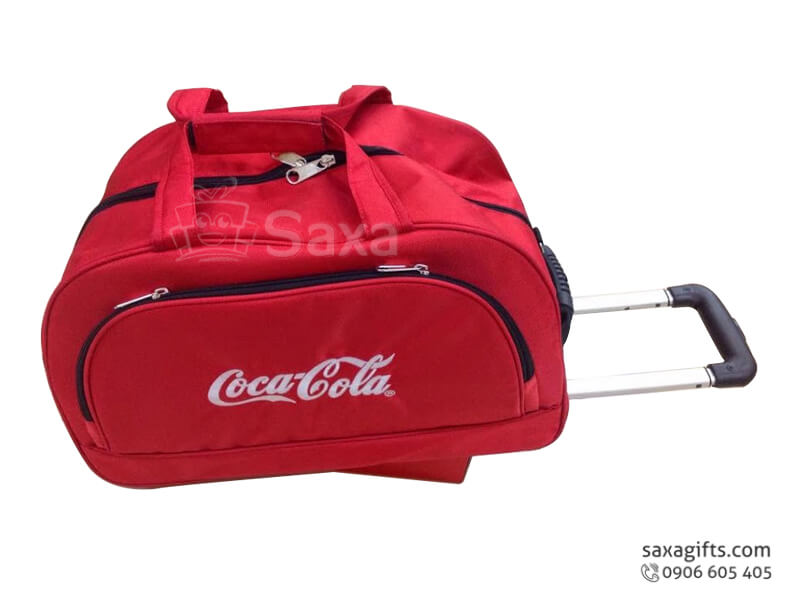 Travelling bag with Cocacola logo printed, pulling handle and many bins