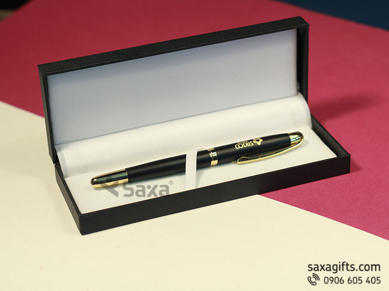 Metal pen with Sikico Group logo engraved and gilded removable cap