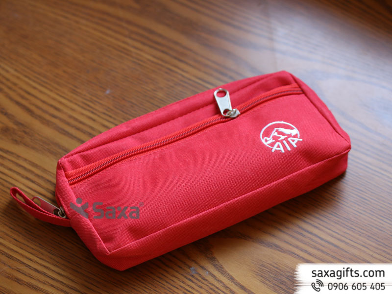 The zipper pen case made of fabric with red color and embroidered AIA logo – Sample 2