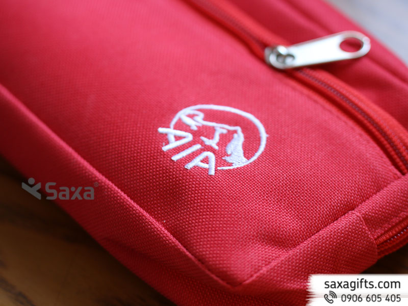 The zipper pen case made of fabric with red color and embroidered AIA logo – Sample 2