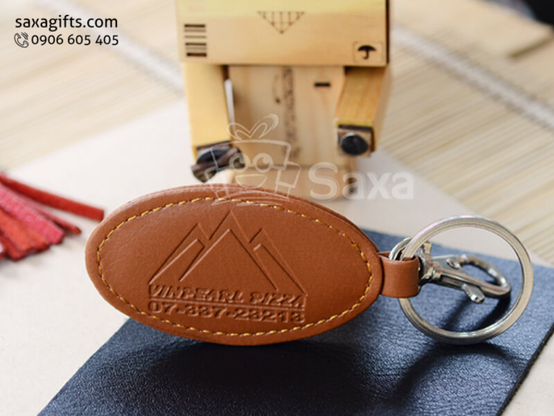 Móc khóa da in logo hình oval khoen bấm giọt nước